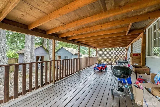 a view of a backyard of the house