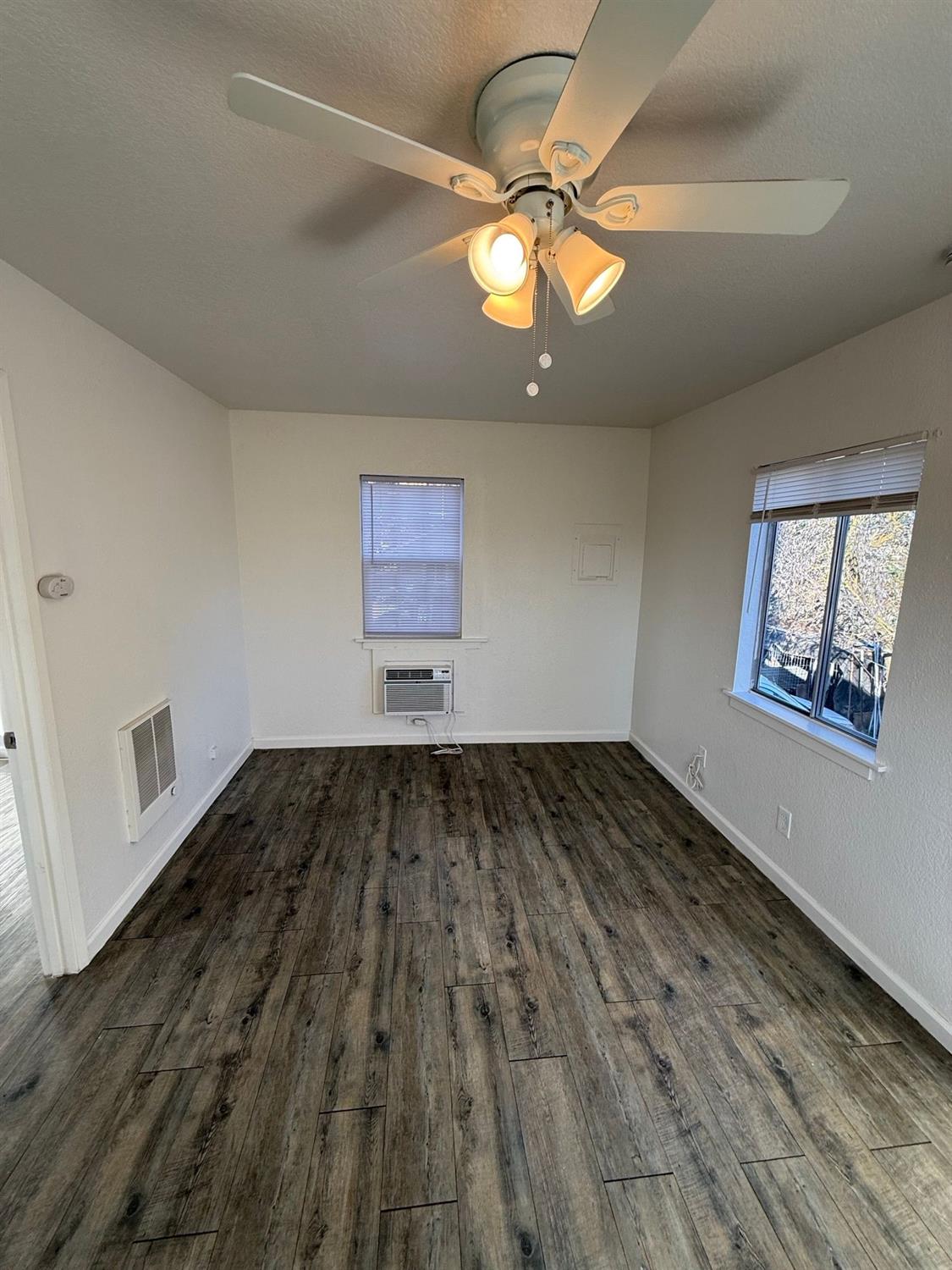 13229 Le Grand Road Le Grand, CA 95333 - Photo 6 of 8 wooden floor in an empty room
