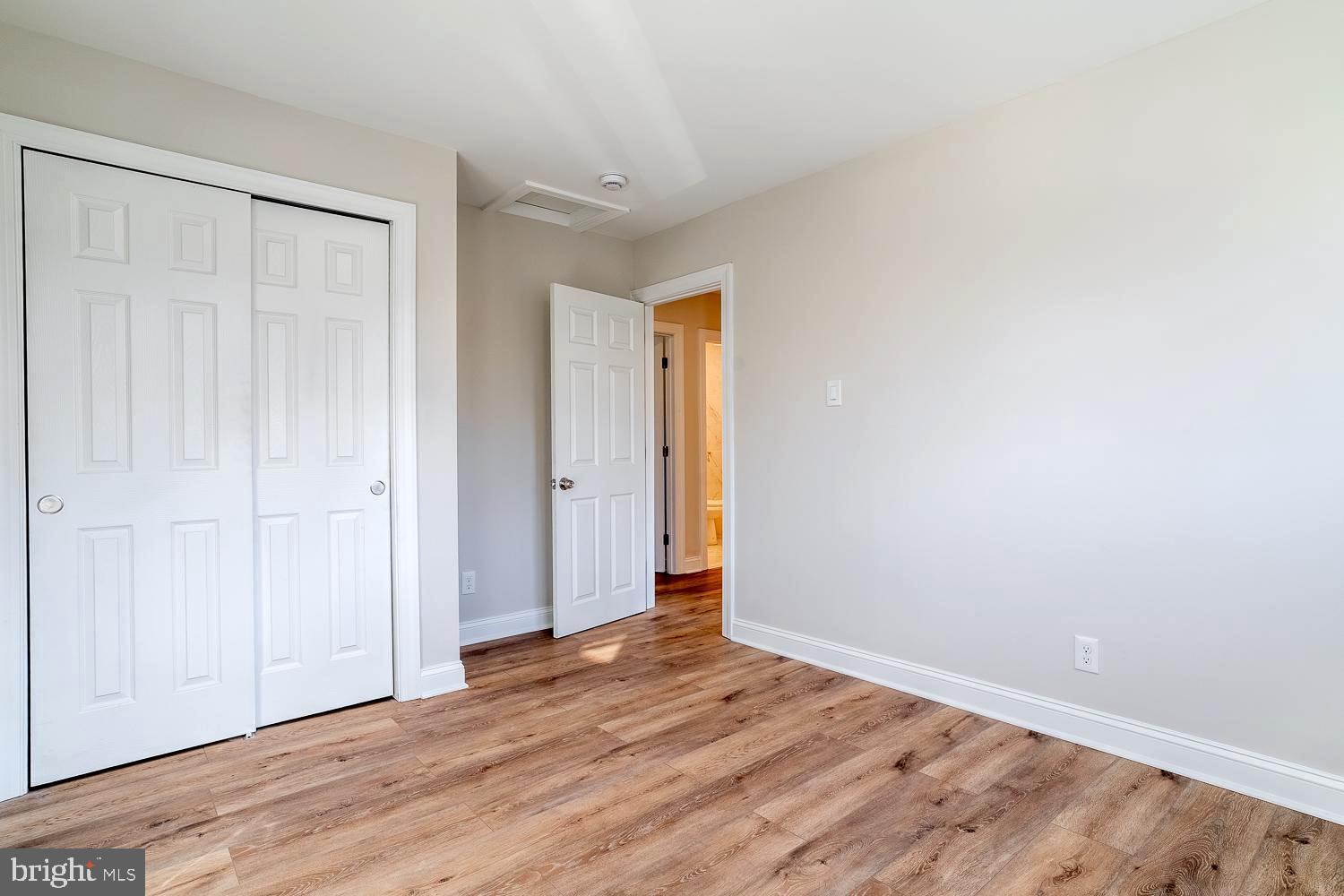 1009 Edgemoor Road Cherry Hill, NJ 08034 - Photo 32 of 49 a view of an empty room with wooden floor