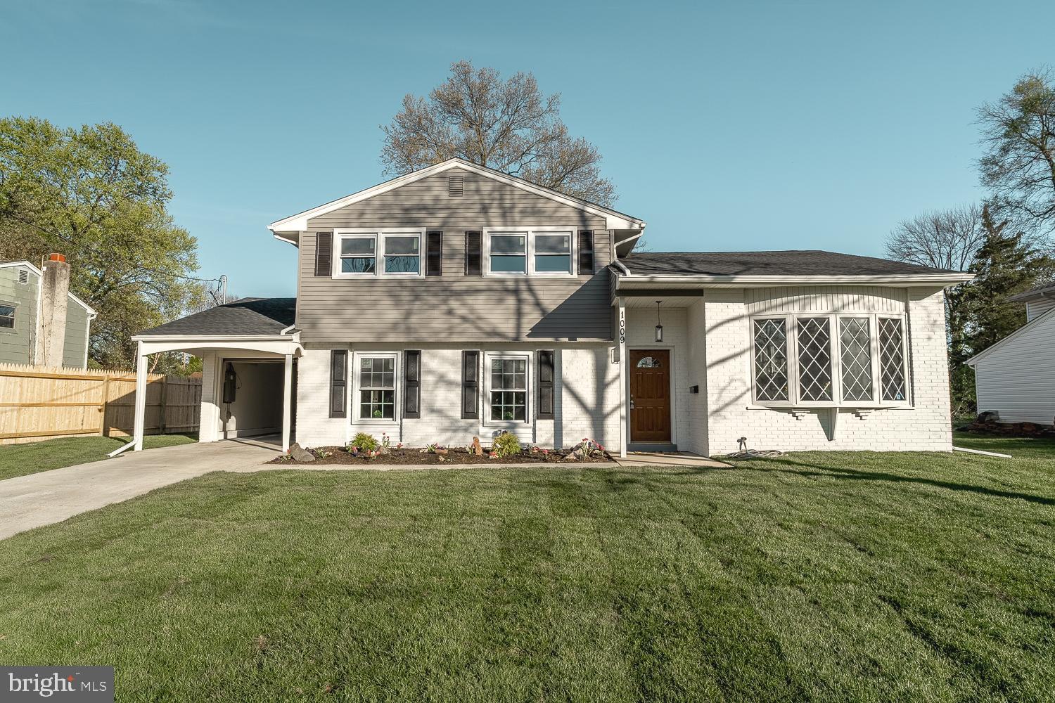 1009 Edgemoor Road Cherry Hill, NJ 08034 - Photo 37 of 49 a front view of a house with a yard