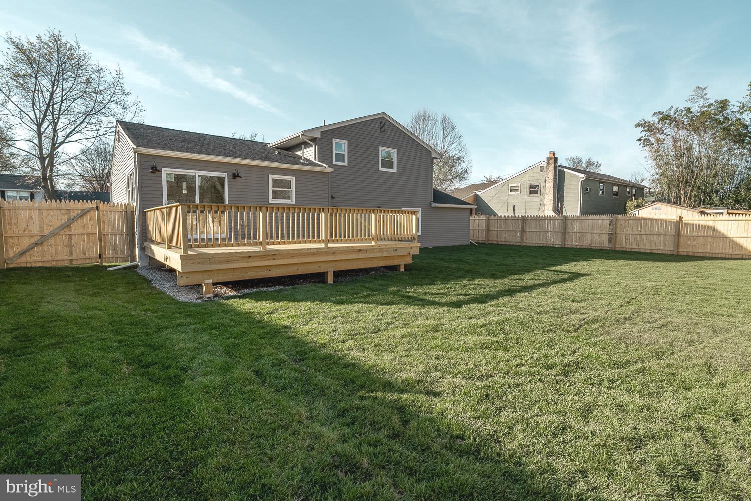 1009 Edgemoor Road Cherry Hill, NJ 08034 - Photo 41 of 49 a view of a house next to a big yard and large trees