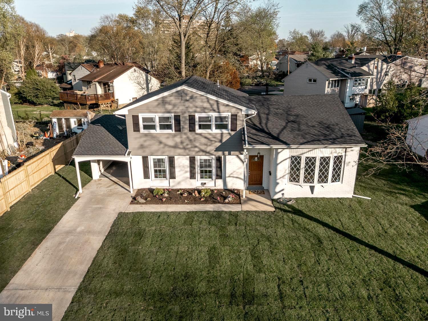 1009 Edgemoor Road Cherry Hill, NJ 08034 - Photo 47 of 49 a front view of a house with a yard
