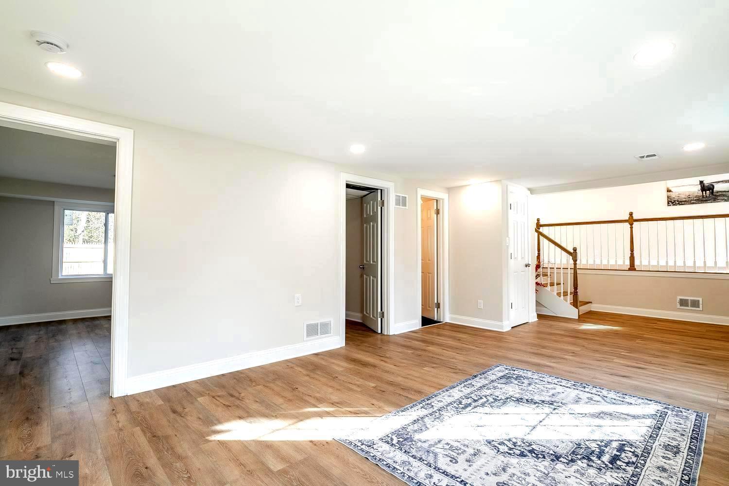 1009 Edgemoor Road Cherry Hill, NJ 08034 - Photo 5 of 49 a view of a bedroom with wooden floor and a window