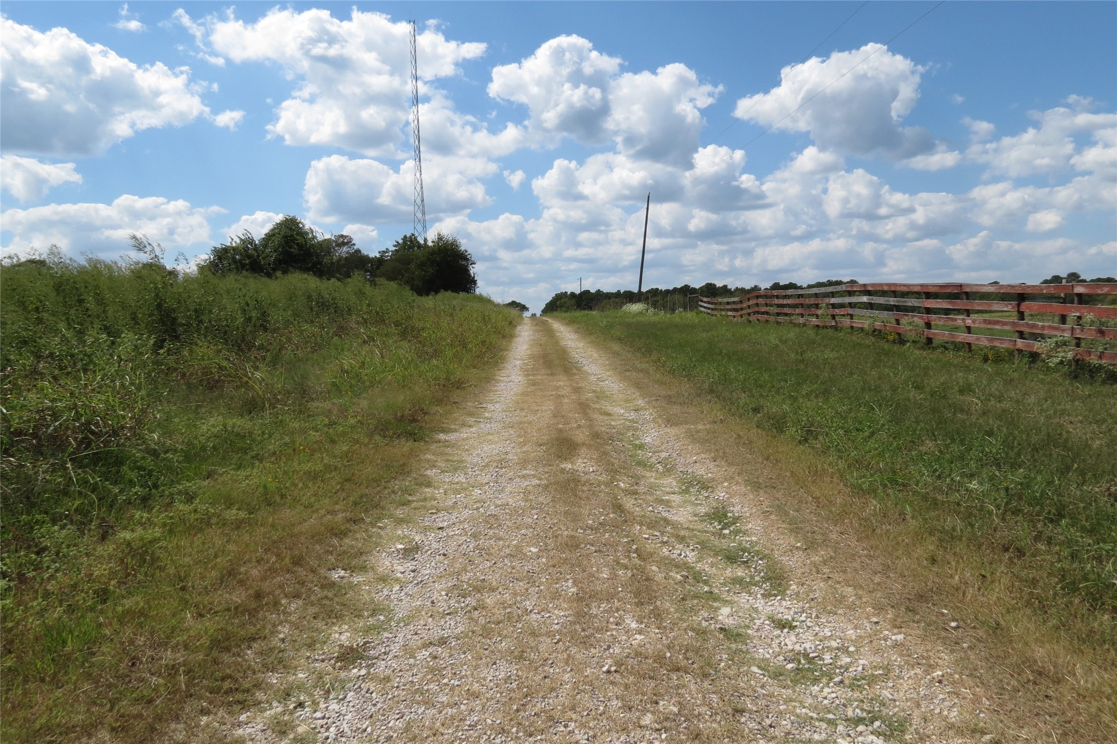 10.24-acres 10.24-acres Townley Ranch Road Huntsville, TX 77320 - Photo 3 of 21 a view of a lake with houses in the back