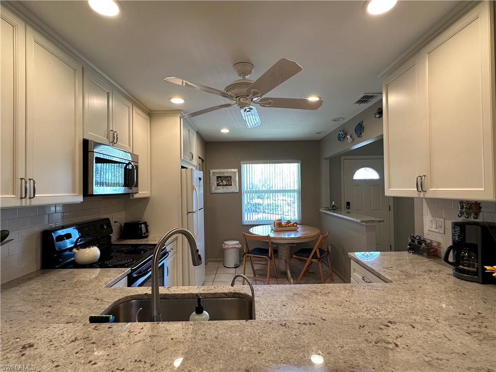5739 Whitaker Road, Unit A202 Naples, FL 34112 - Photo 2 of 18
