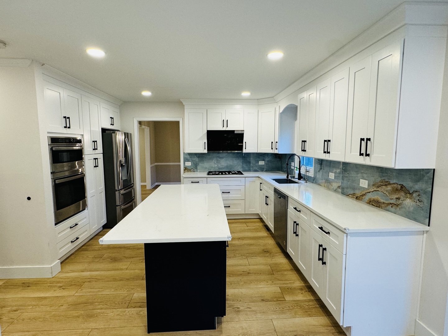 1398 East Gartner Road Naperville, IL 60540 - Photo 6 of 31 a large kitchen with stainless steel appliances kitchen island granite countertop a stove a sink and a microwave