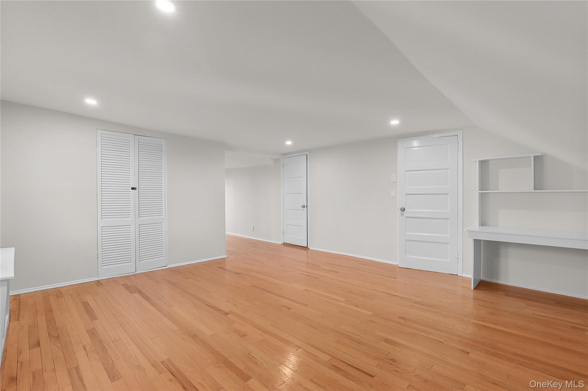 8 Virginia Avenue, Unit 1 Dobbs Ferry, NY 10522 - Photo 9 of 16 a view of an empty room with wooden floor