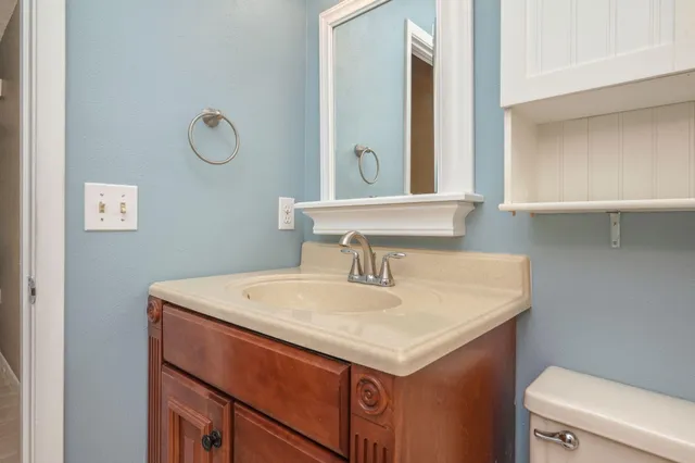 a bathroom with a sink and a toilet