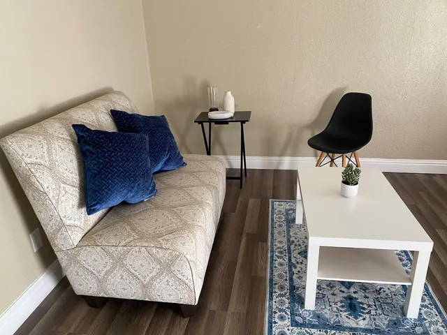 a kitchen with stainless steel appliances a stove a refrigerator and a sink