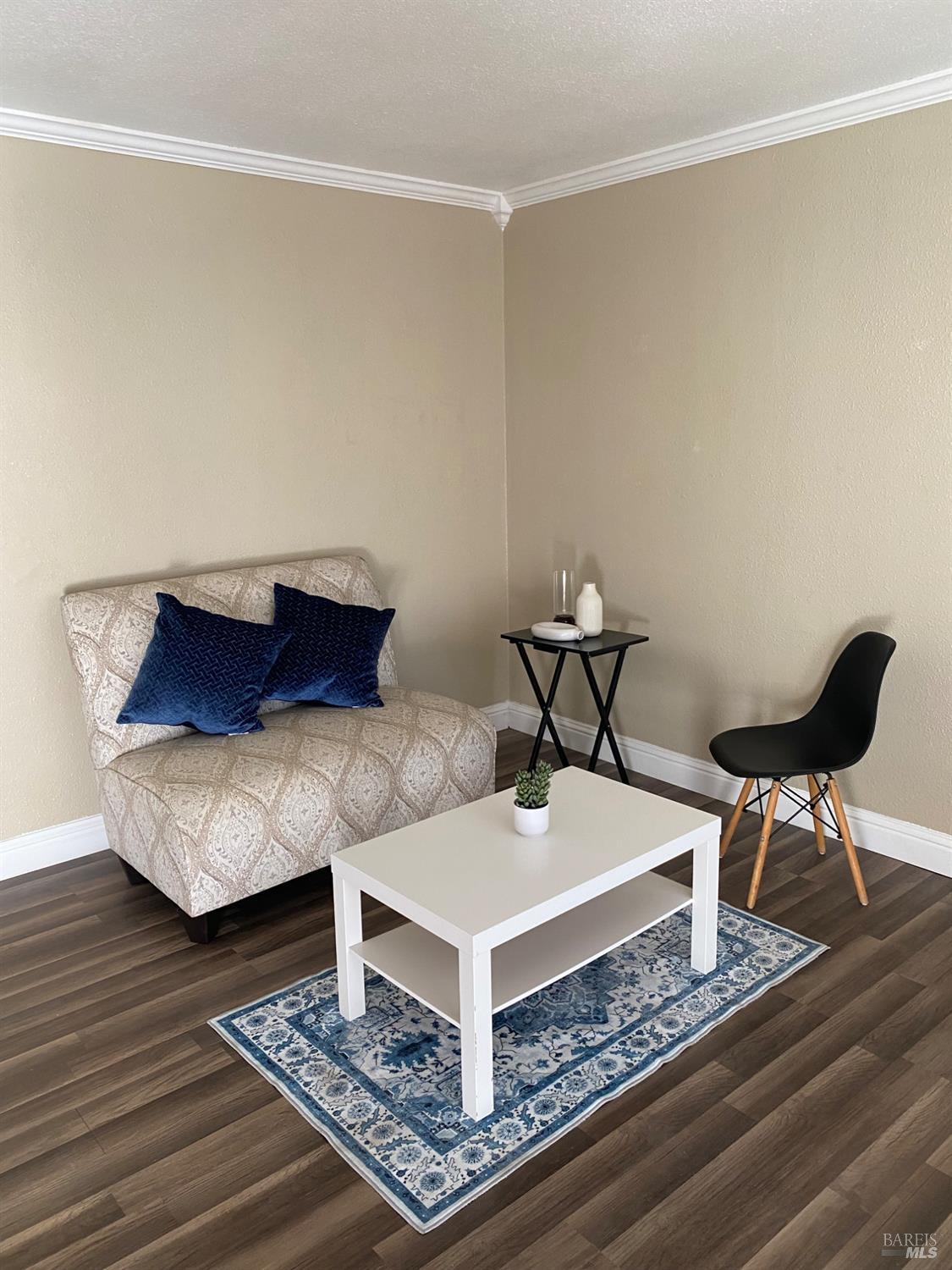 129 Foster Street Vallejo, CA 94591 - Photo 22 of 37 a living room with furniture and wooden floor