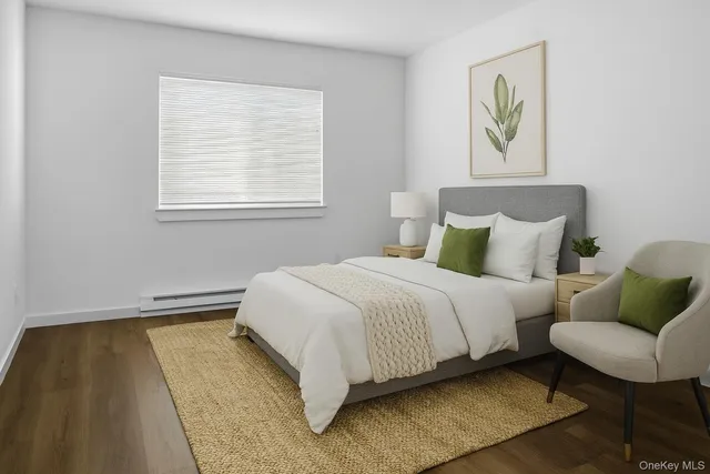 a bedroom with bed and a couch