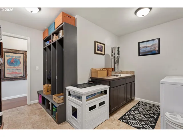 a bathroom with a sink toilet and mirror