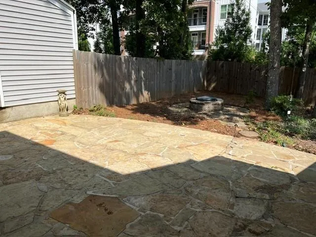 a view of a backyard of the house