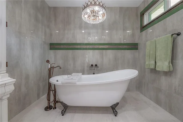 a view of a livingroom with an empty space and a window