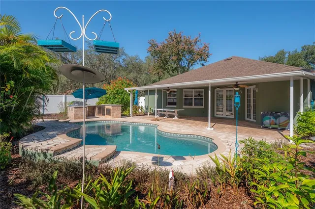 a view of a chair and table in the yard