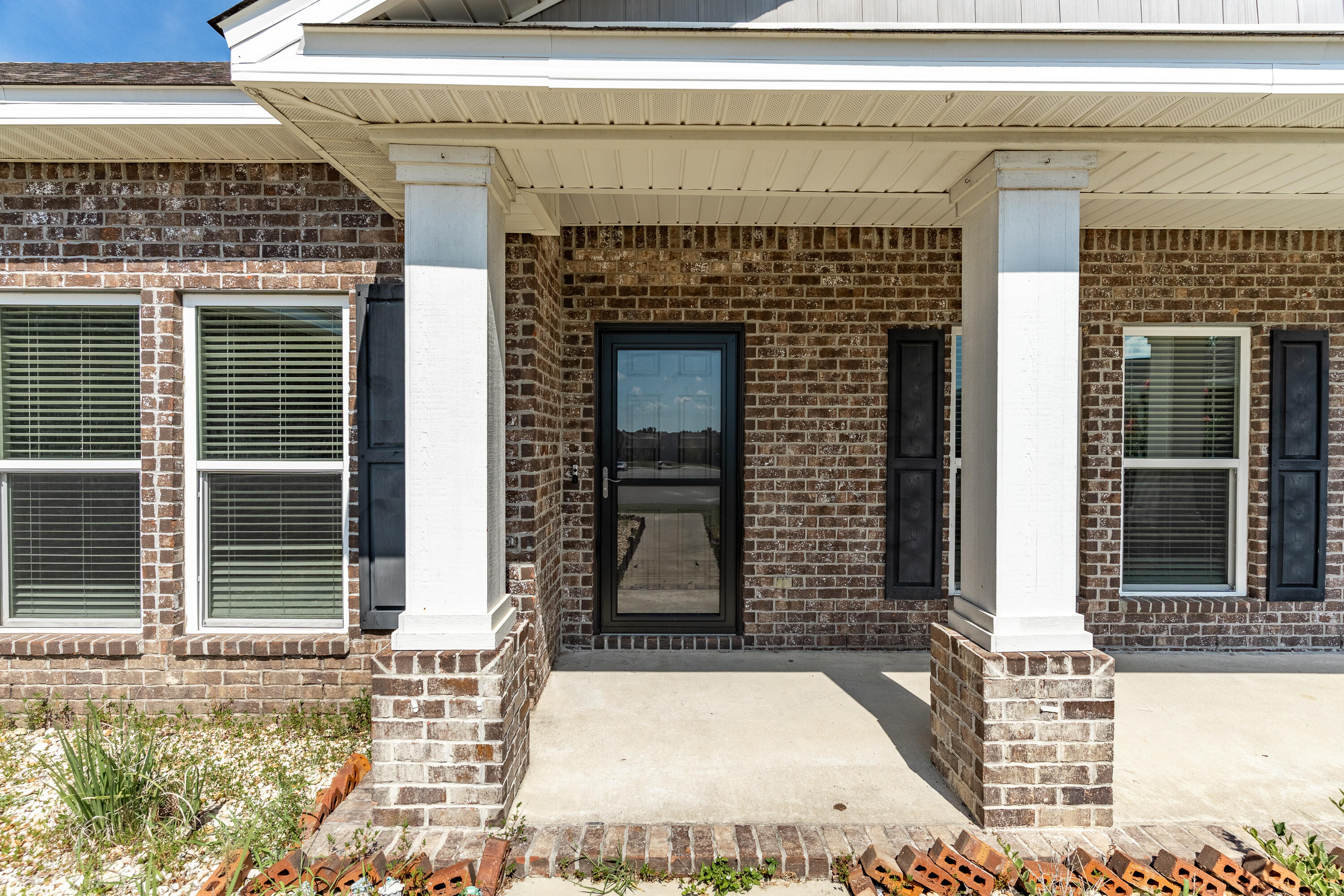 a front view of a house with a garage