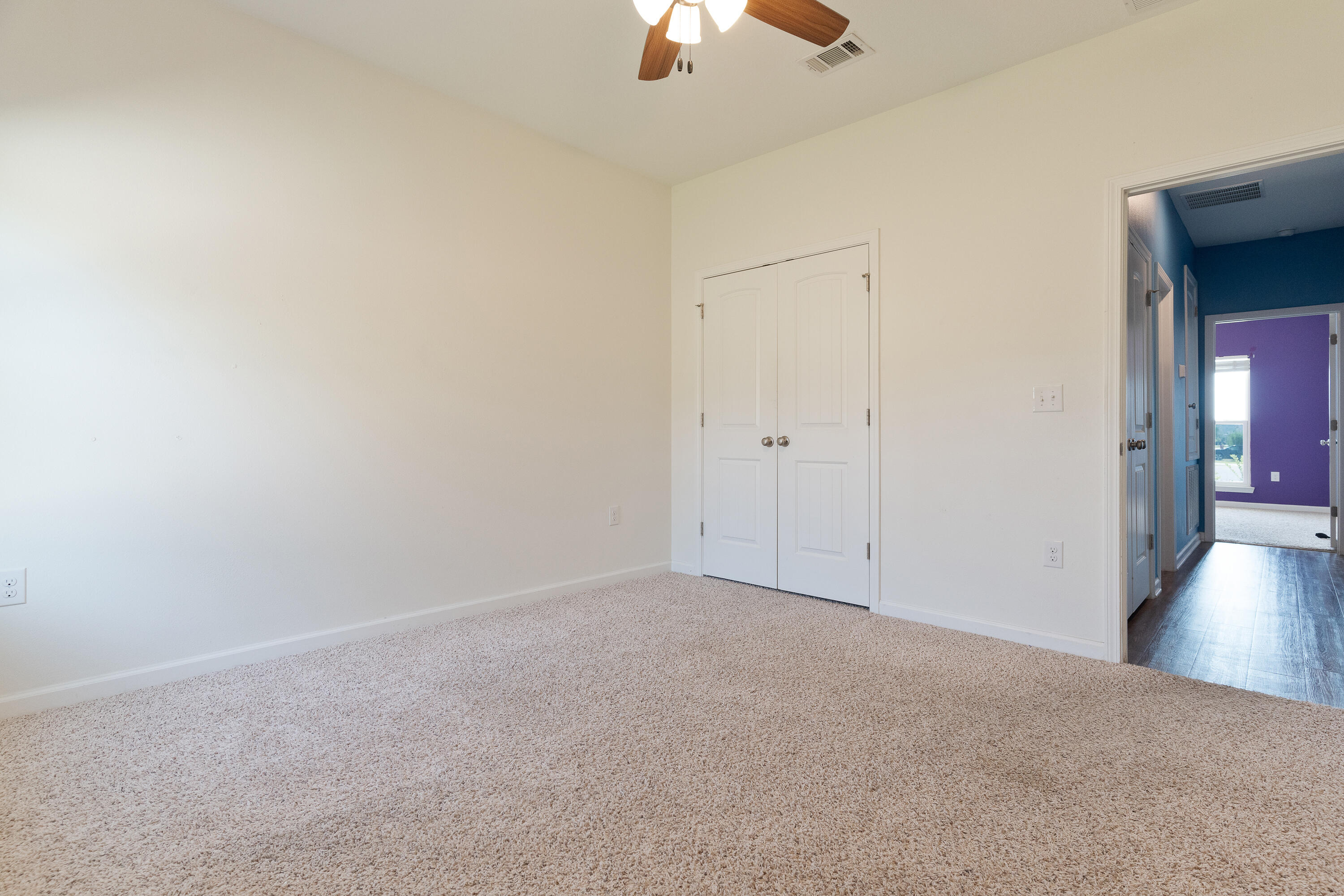 303 Merlin Court Crestview, FL 32539 - Photo 37 of 54 a view of an empty room and chandelier fan