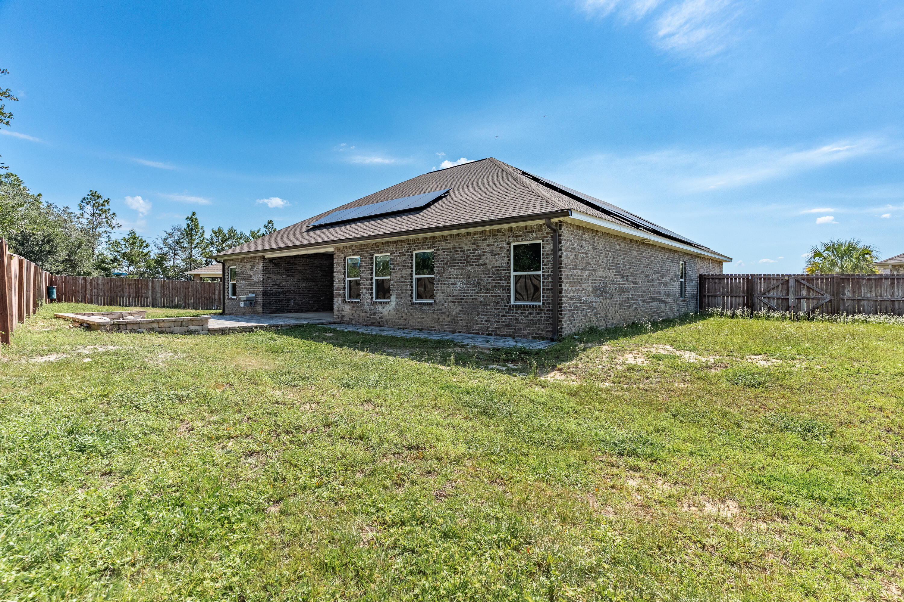 303 Merlin Court Crestview, FL 32539 - Photo 52 of 54 a view of a house with a yard
