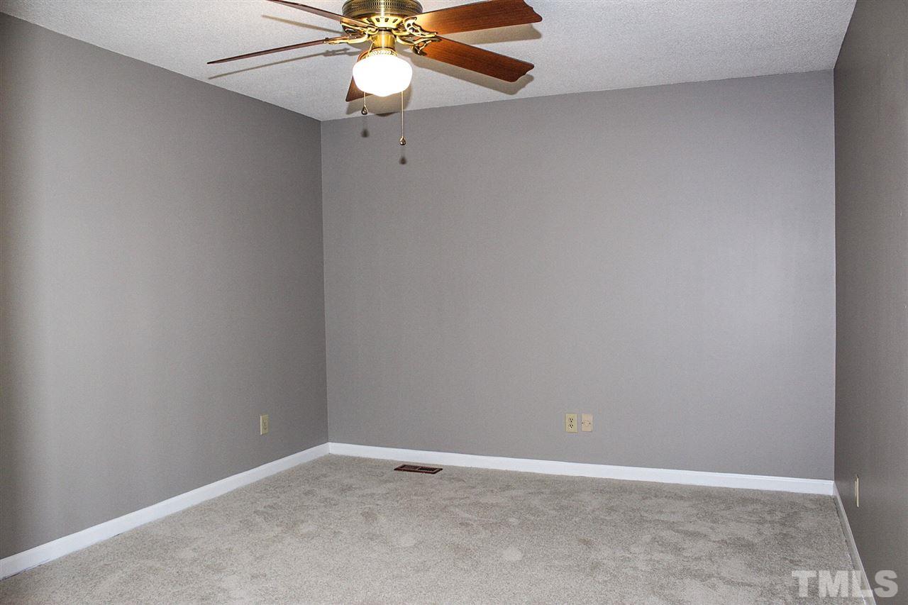 9444 Springdale Drive Raleigh, NC 27613 - Photo 25 of 25 an empty room