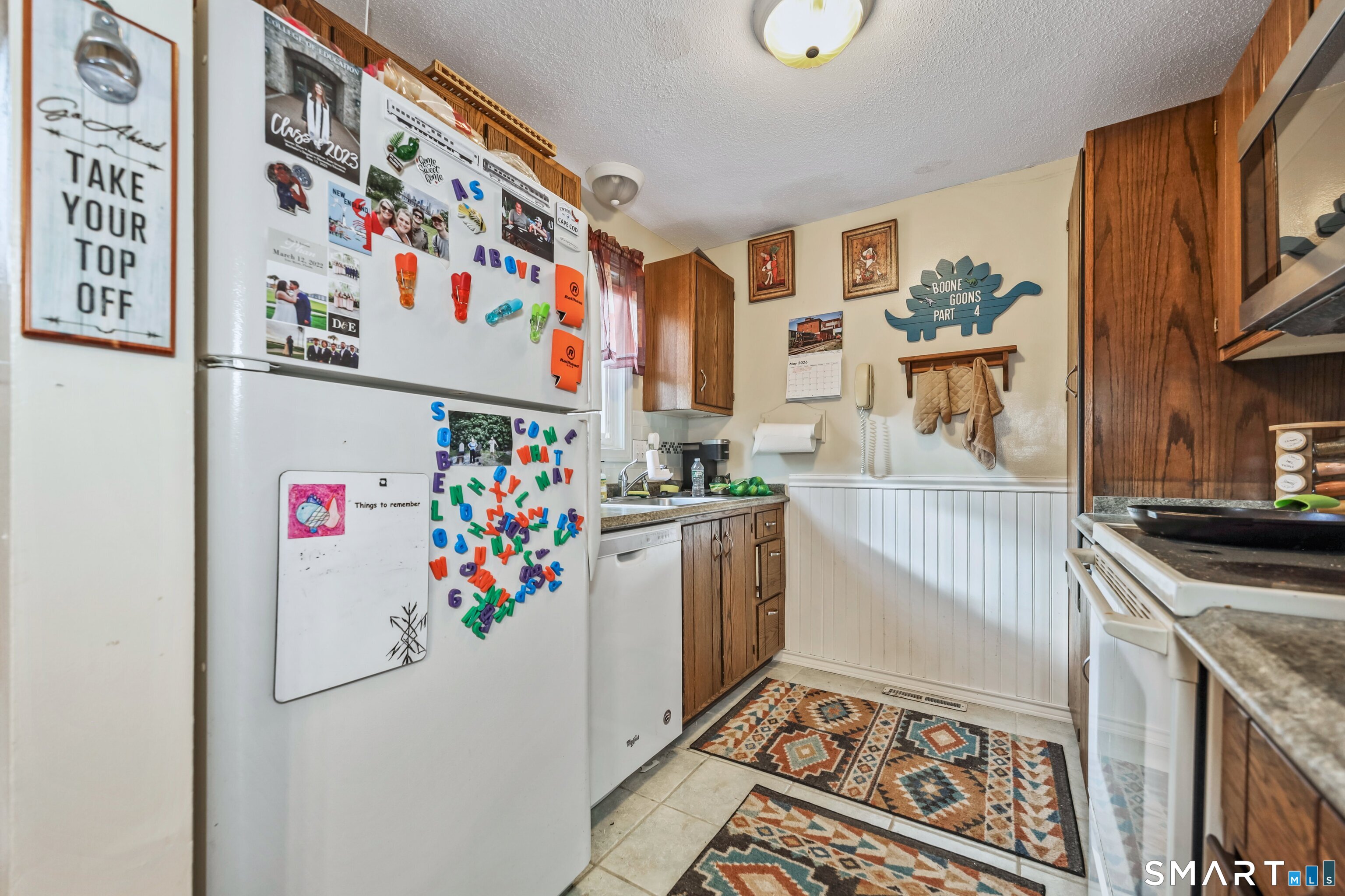 349 Allen Road, Unit 34C Torrington, CT 06790 - Photo 11 of 31 a view of a kitchen with stainless steel appliances and cabinets
