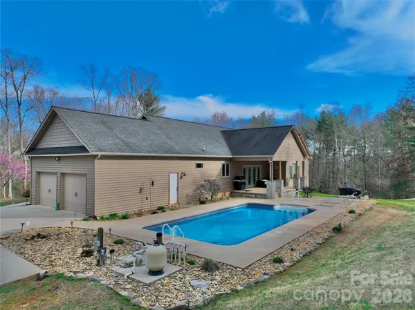 a house view with a backyard space