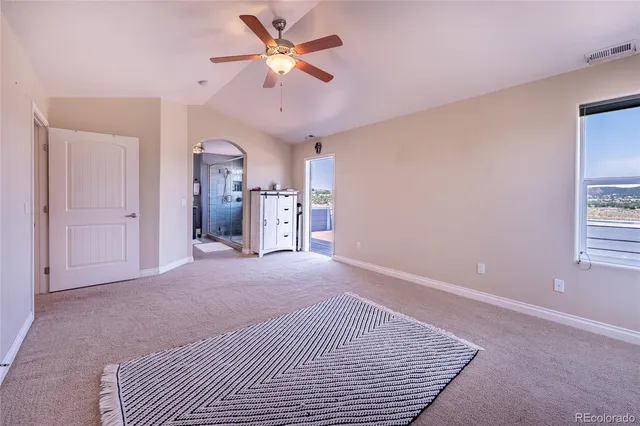 a view of a livingroom with a workspace