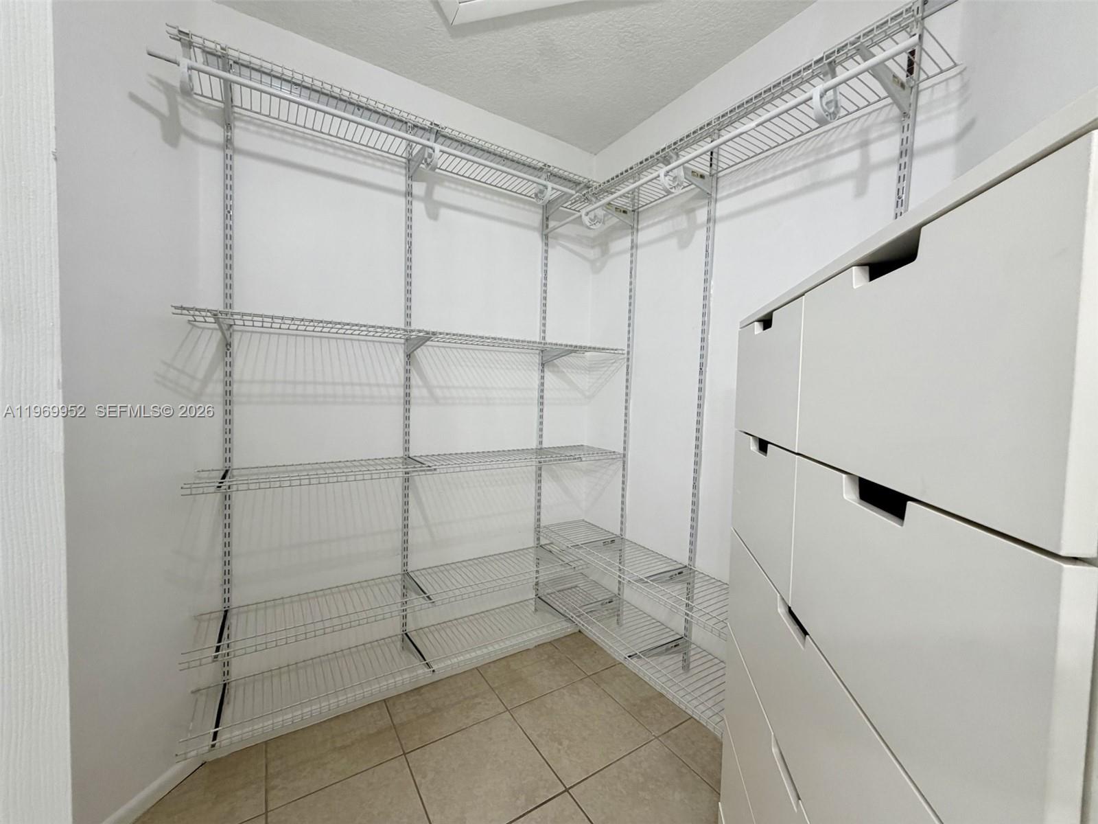 9658 Southwest 138th Avenue, Unit 9658 Miami, FL 33186 - Photo 13 of 20 Primary Closet
