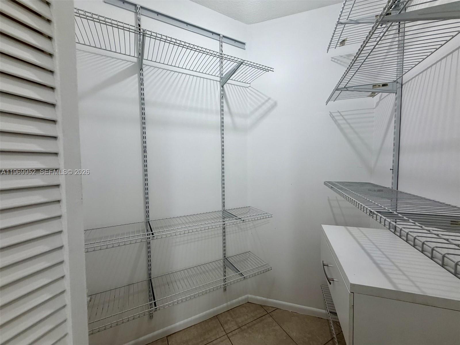 9658 Southwest 138th Avenue, Unit 9658 Miami, FL 33186 - Photo 17 of 20 Second Bedroom Closet