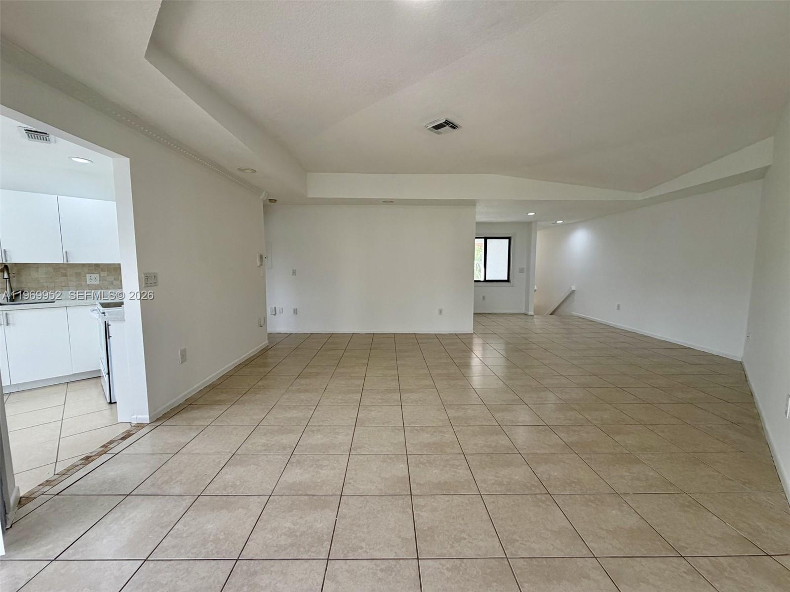 9658 Southwest 138th Avenue, Unit 9658 Miami, FL 33186 - Photo 5 of 20 Living Dining Area