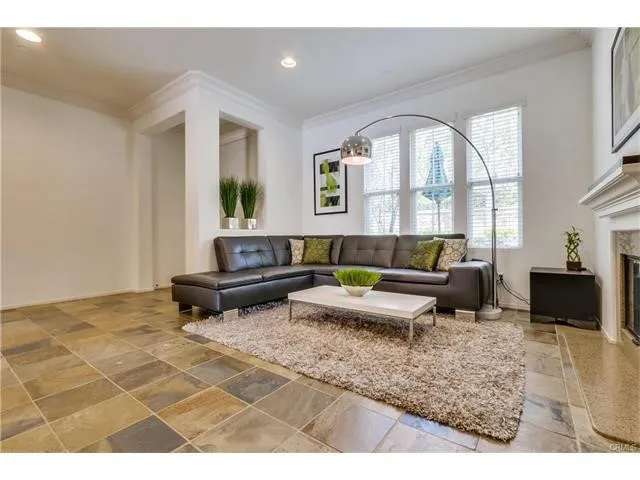 a living room with furniture and a couch