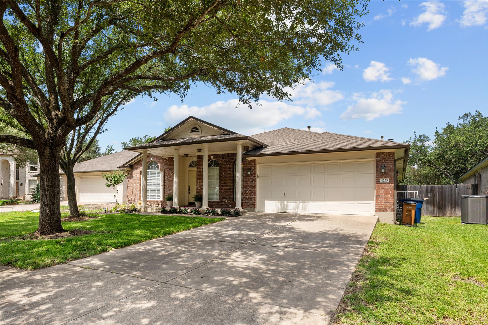 4725 Tello Path Austin, TX 78749 - Photo 32 of 34 A classic brick exterior offers timeless curb appeal with an inviting covered porch and attached garage.