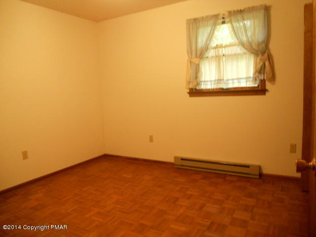 3 Edgewood Road Mount Pocono, PA 18344 - Photo 8 of 23 an empty room with a window