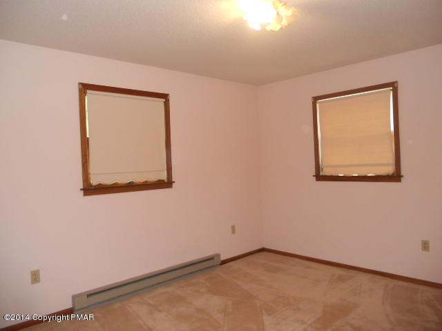 3 Edgewood Road Mount Pocono, PA 18344 - Photo 9 of 23 an empty room with a window