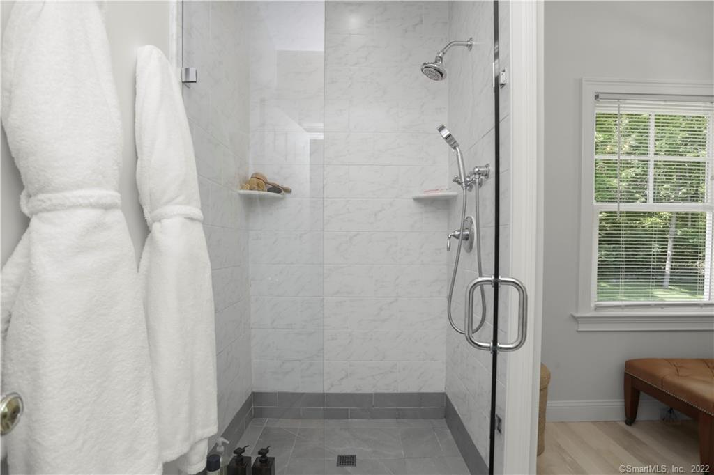 220 Burr Street Fairfield, CT 06824 - Photo 16 of 34 a bathroom with a shower