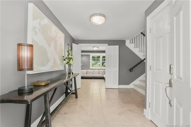 a view of living room with furniture and a window
