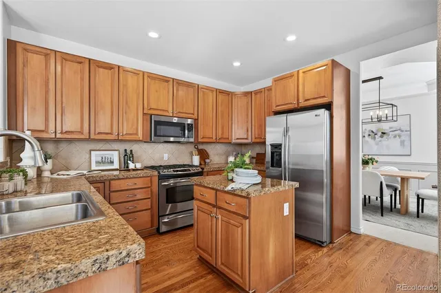 a utility room with sink dryer and washer