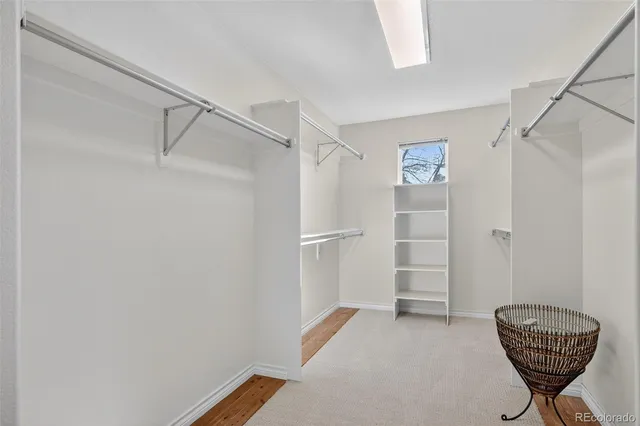 a view of an empty room with a fireplace