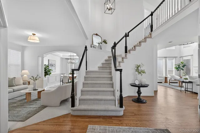 a living room with furniture and a rug