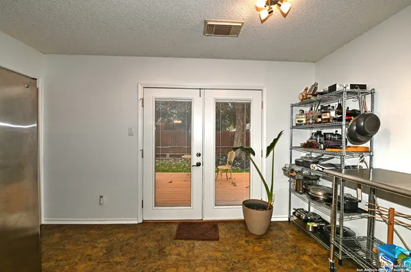 a view of a living room and dining room