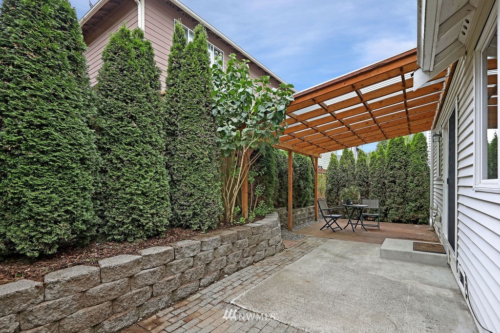 2516 194th Street Southeast Bothell, WA 98012 - Photo 12 of 28 a view of patio with table and chairs under an umbrella
