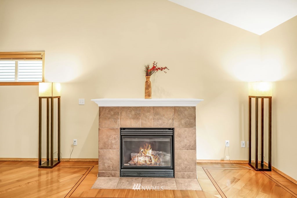 2516 194th Street Southeast Bothell, WA 98012 - Photo 6 of 28 a living room with furniture and a fireplace