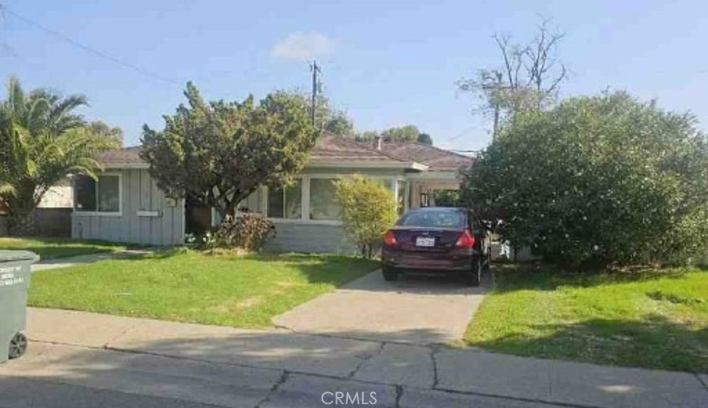45 Gardiner Way Rio Vista, CA 94571 - Photo 2 of 4 a front view of a house with a garden and trees
