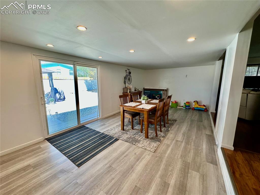 1701 Jerry Murphy Road Pueblo, CO 81001 - Photo 8 of 20 Dining area with wood finished floors, recessed lighting, and baseboards