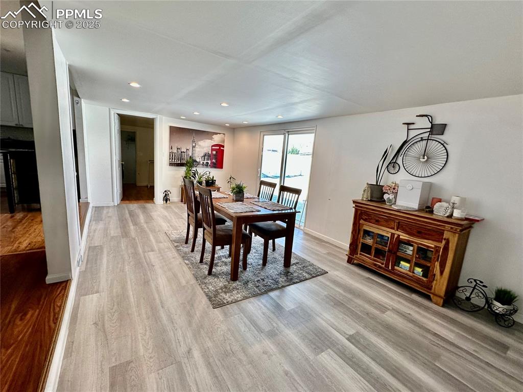 1701 Jerry Murphy Road Pueblo, CO 81001 - Photo 9 of 20 Dining room featuring light wood-type flooring, recessed lighting, and baseboards