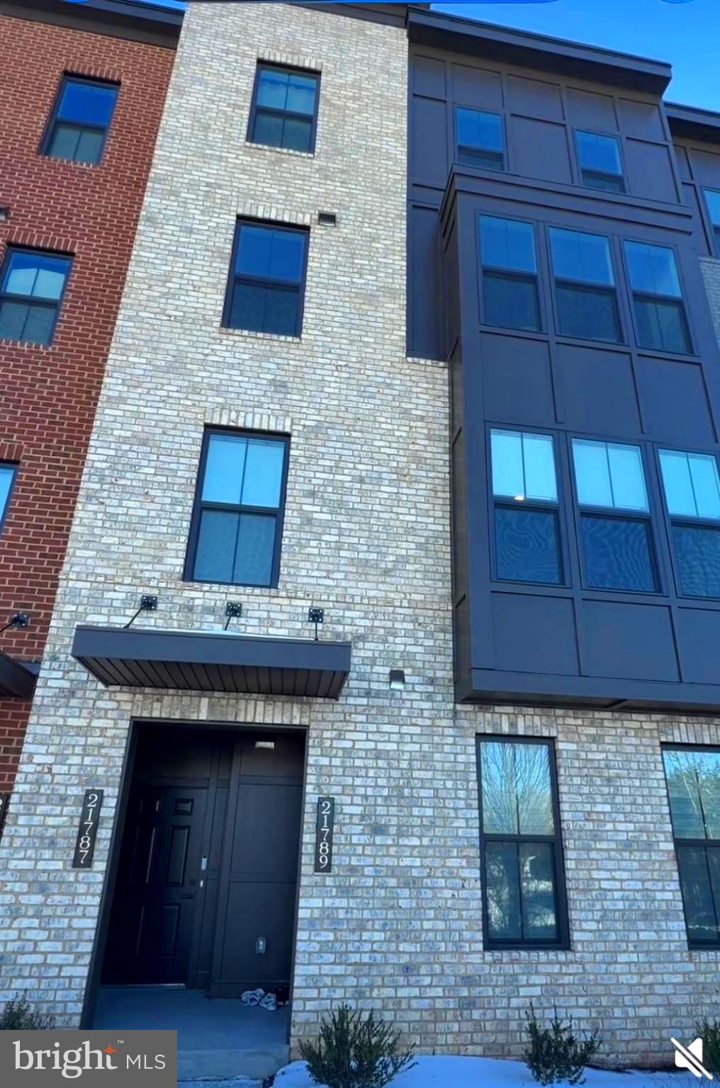 a brick building with a sink and a stove