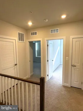 a view of hallway with stairs