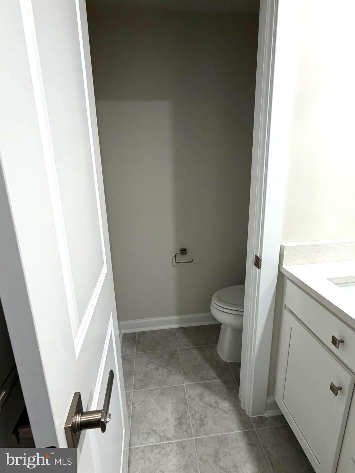 21789 Express Terrace Ashburn, VA 20147 - Photo 16 of 36 a bathroom with a sink and a toilet