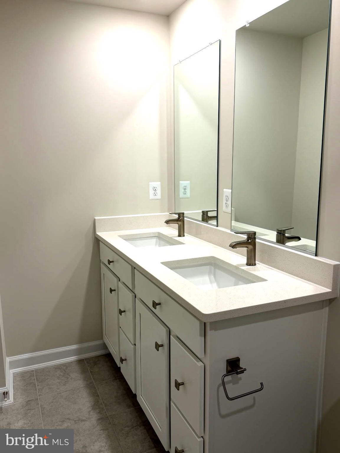 21789 Express Terrace Ashburn, VA 20147 - Photo 21 of 36 a bathroom with a sink and a mirror