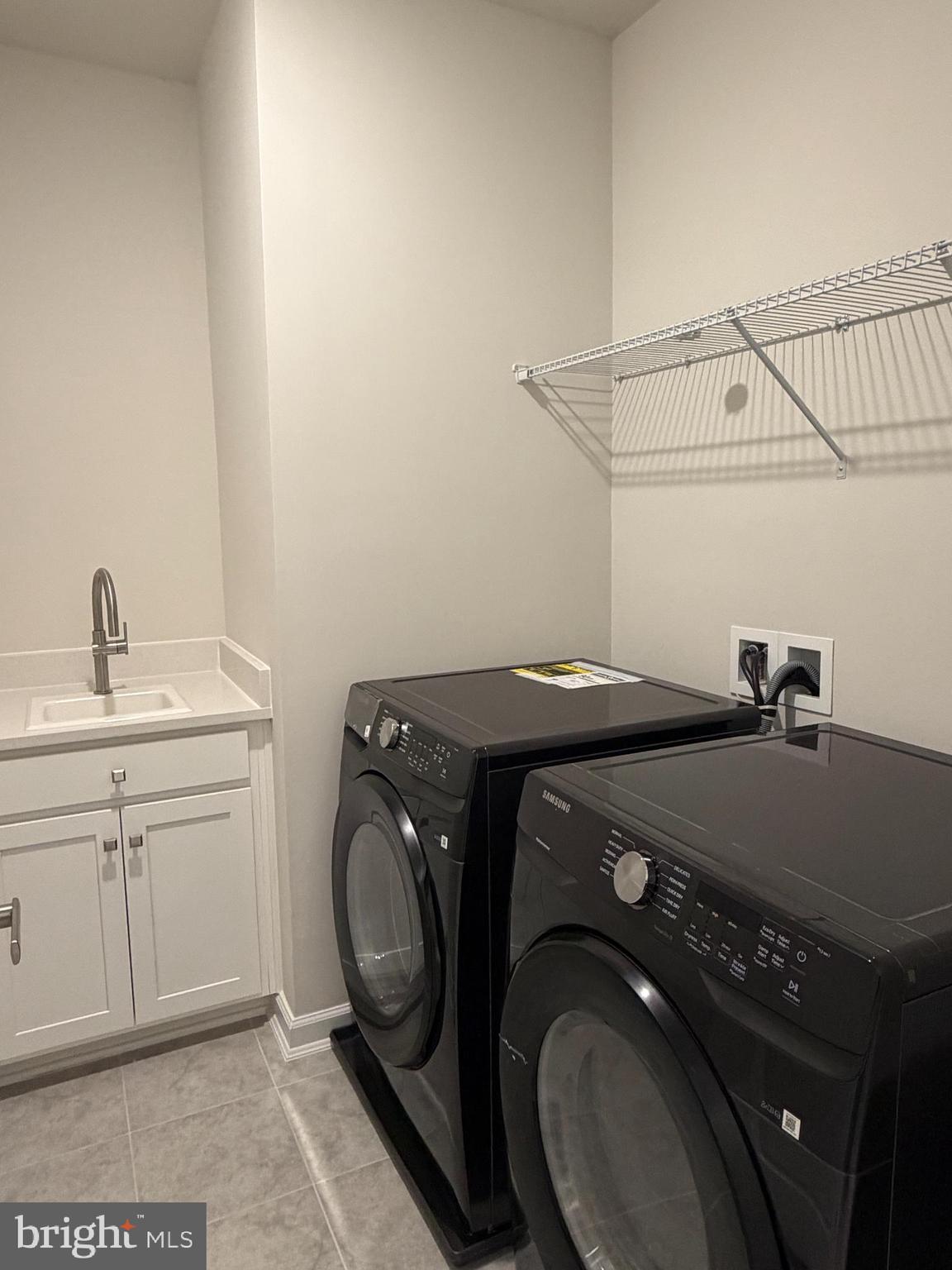 21789 Express Terrace Ashburn, VA 20147 - Photo 23 of 36 a utility room with dryer and washer