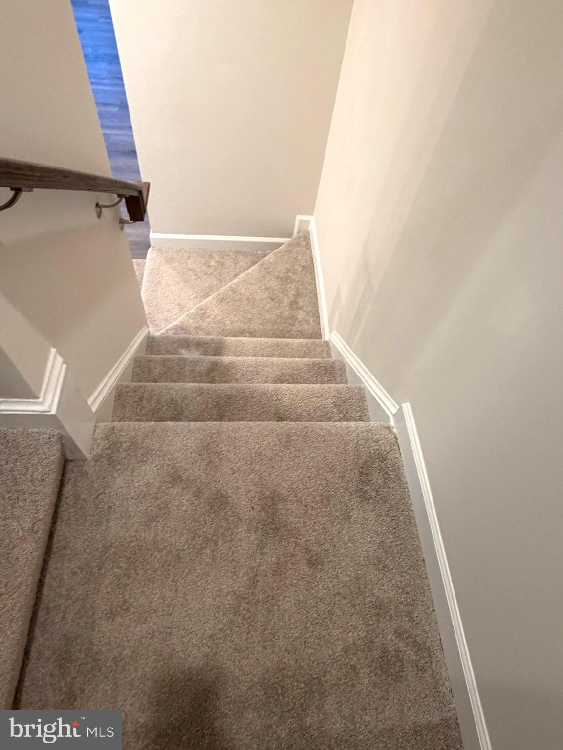 21789 Express Terrace Ashburn, VA 20147 - Photo 10 of 36 a view of staircase with white walls